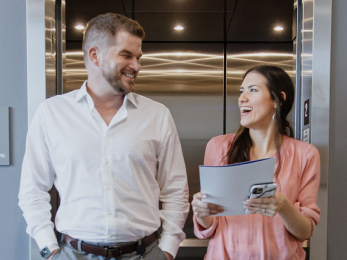 Business Professionals in an Elevator